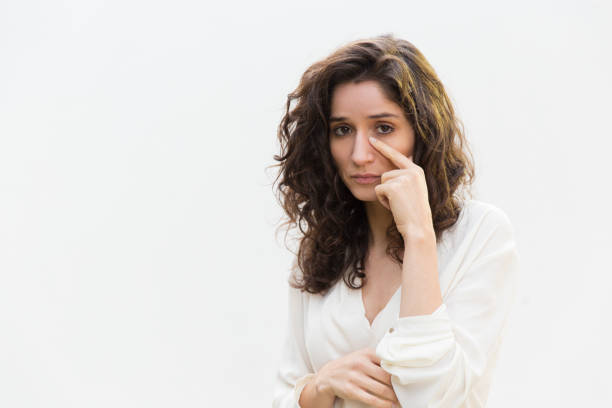 istock Sad unhappy woman removing tears from face 1193280942