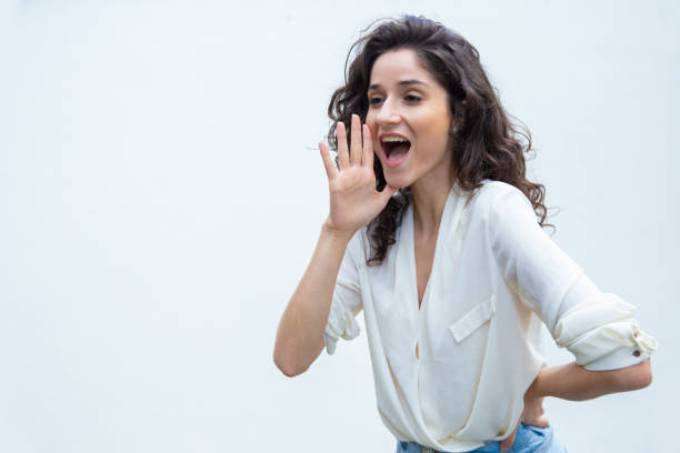 istock Cheerful positive student girl shouting loud 1193286390