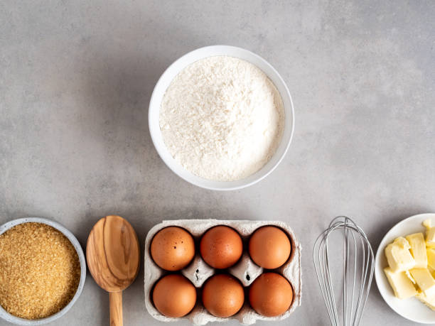 istock Ingredients for a cake on a gray background 1193286721