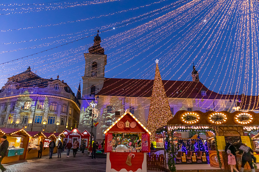 Sibiu, Romania - 25 November 2019: Christmas market and decoration lights in Sibiu main square, Transylvania, Romania