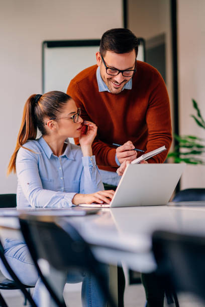 istock Young businesspeople working together 1193287681