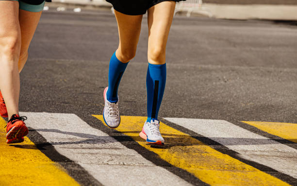 istock legs two female runners 1193288965