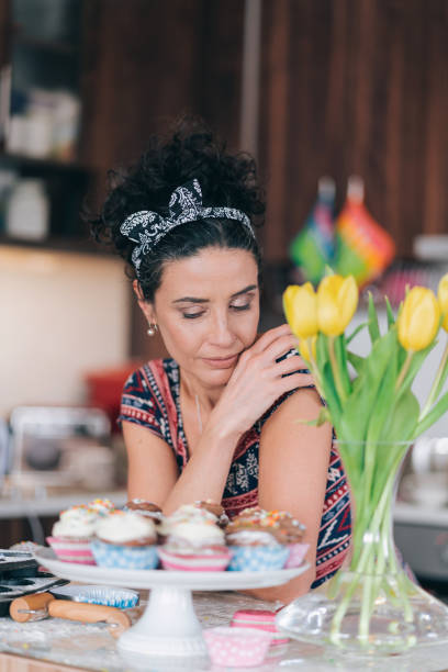 istock Sad mid adult woman having relationship problems, standing in kitchen 1193291438