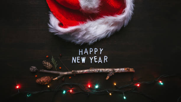 istock Happy New Year text with Santa Claus hat 1193292279