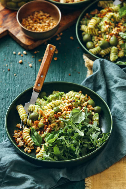 istock Summer vegetarian pasta salad with broccoli pesto 1193293022