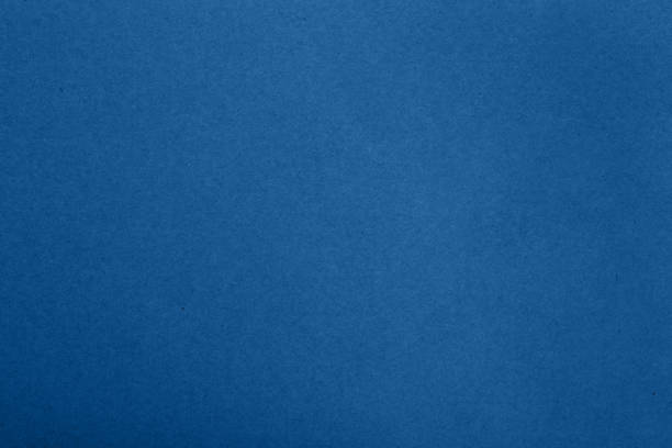 istock Blue paper parchment background with fibers 1193293105