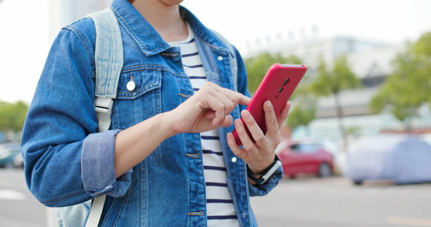 istock asian woman use 5G smartphone 1193297155