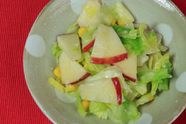 istock Dish of apple, cone and carrot salad (coleslaw) 1193297388
