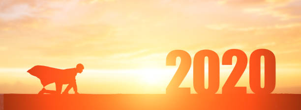 silhouette businessman go to 2020