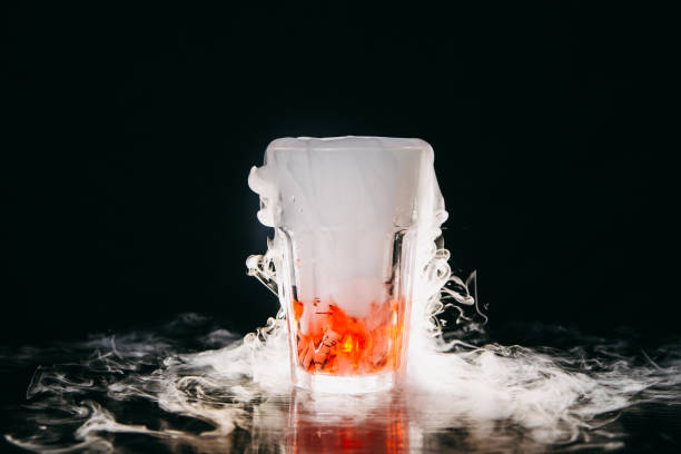Orange smoking cocktail on black background