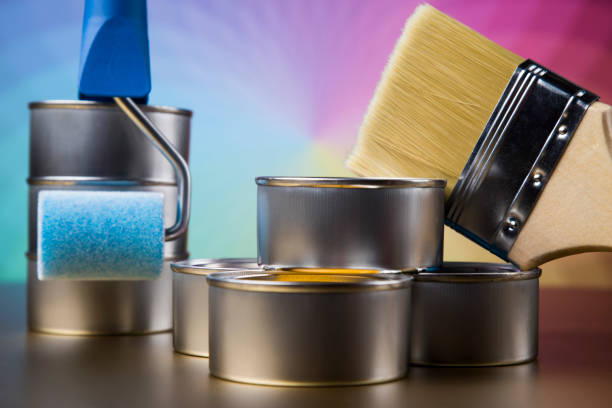 istock Tin cans with paint, brushes and bright palette of colors 1193300413