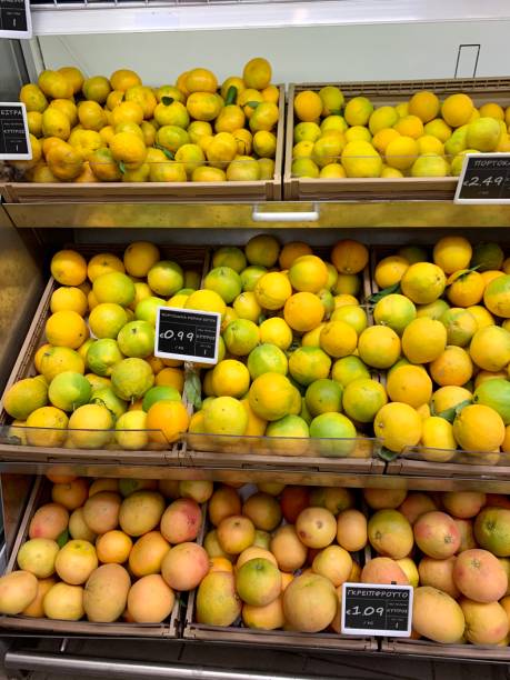 Orange tangerines grapefruit in the supermarket