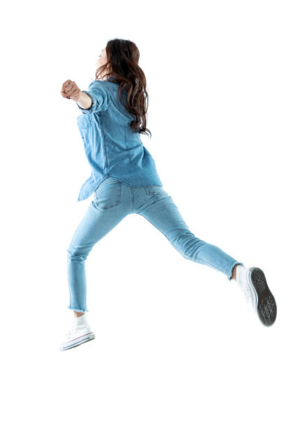 istock Woman running on white background 1193304759