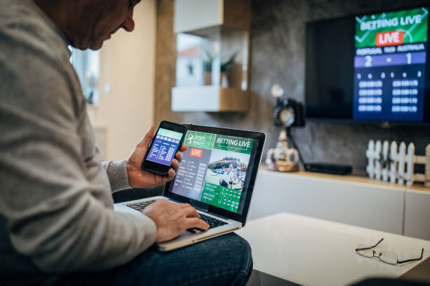 istock Man using online app for live betting 1193305238