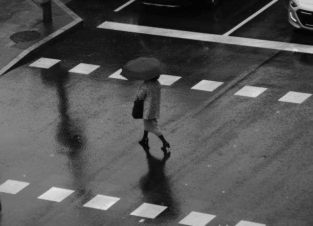 istock People walking in the rain 1193306436
