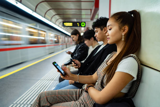 istock Asian friends occupied with smart phone 1193307397