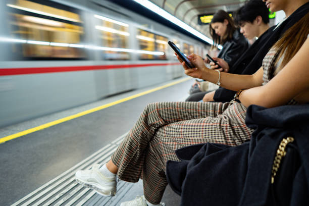 istock Asian friends occupied with smart phone 1193307574