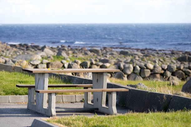 istock Rest stop area picnic site on sea shore 1193307753