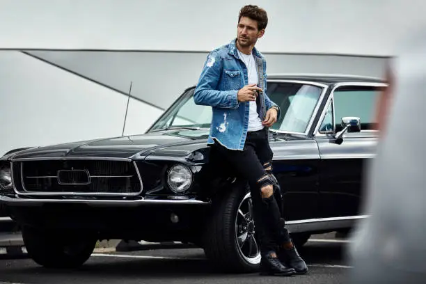 Photo of Handsome man with old classic car