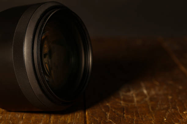 istock The mirror camera is on a wooden table 1193309395