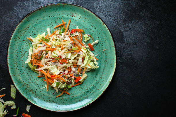 istock healthy vegetable salad (Chinese cabbage, carrot, onion, lettuce, mix salad, pumpkin) menu concept. food background. top view. copy space 1193309471