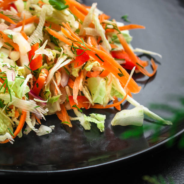 istock healthy vegetable salad (Chinese cabbage, carrot, onion, lettuce, mix salad, pumpkin) menu concept. food background. top view. copy space 1193309477