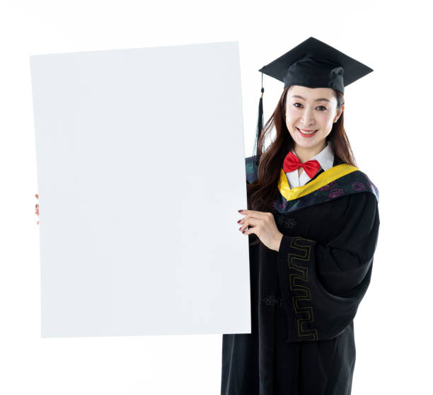 istock Graduate student holding blank placard 1193312577