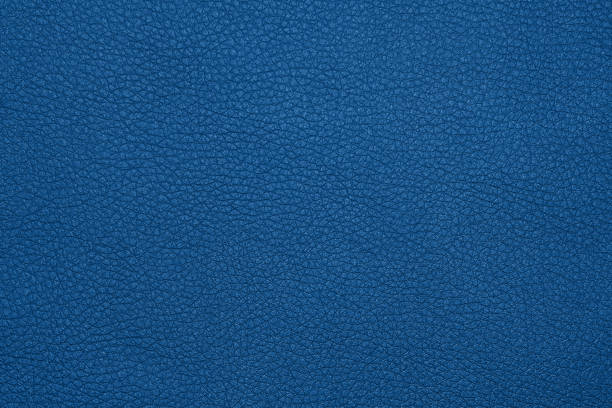 Background texture of blue natural leather grain Close up background texture pattern of dark blue natural classic leather grain, directly above fake leather stock pictures, royalty-free photos & images