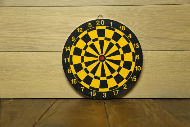 istock A dart board is standing on the table 1193313874
