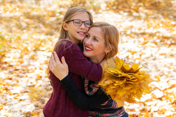 istock Daughter and mother hug 1193315283