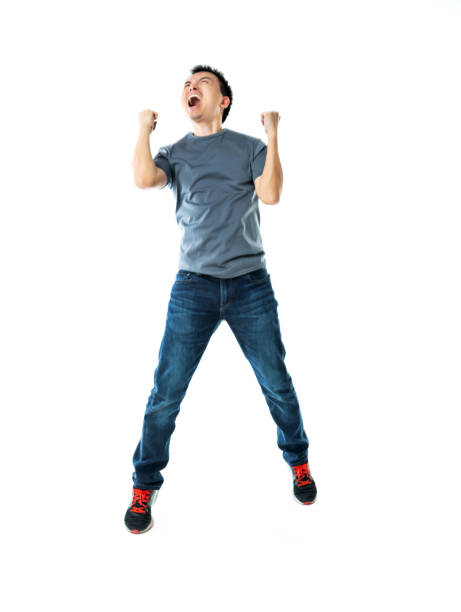 istock Excited man cheering on white background 1193317626