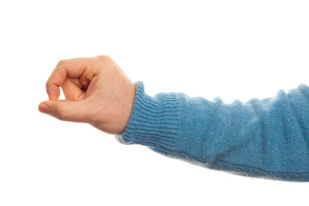 istock Close-Up Of Hand Against White Background 1193323135