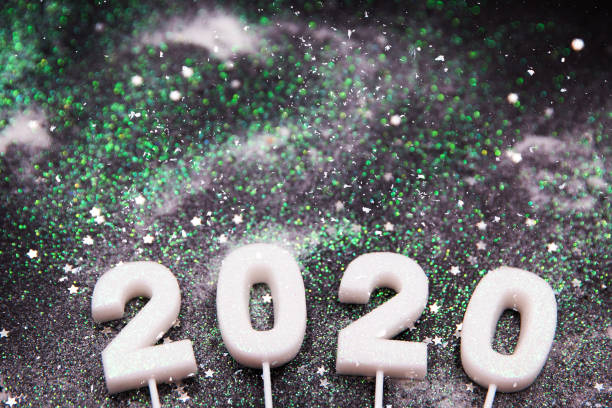istock Glamour snowy white sparkling background with numbers 2020. 1193328530
