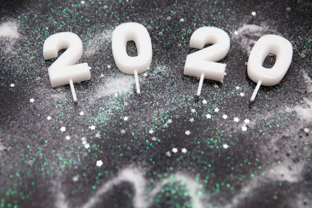 istock Glamour snowy white sparkling background with numbers 2020. 1193328549