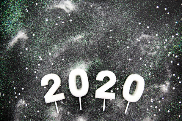 istock Glamour snowy white sparkling background with numbers 2020. 1193328557