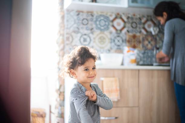 istock Little girl playing at home 1193329307