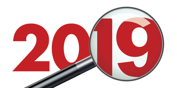 ilustraciones, imágenes clip art, dibujos animados e iconos de stock de el año 2019 se examinó a través de una lupa para simbolizar el balance - 2019