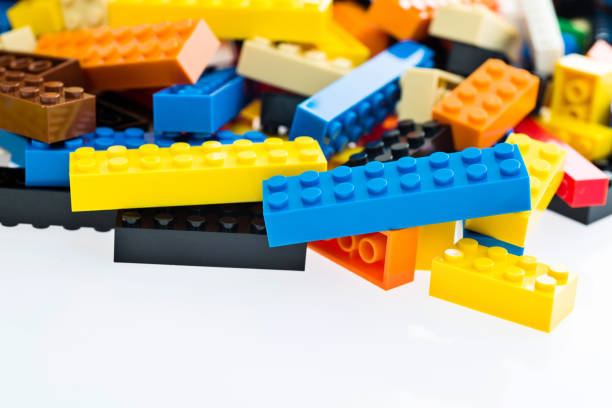 istock Heap of plastic blocks on white background 1193329921