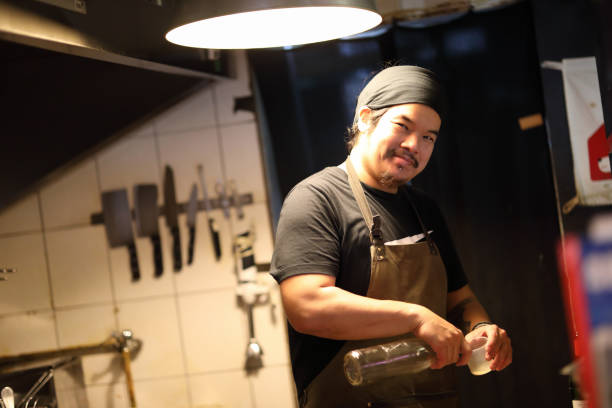 istock Chef preparing cuisine in kitchen portrait 1193330823