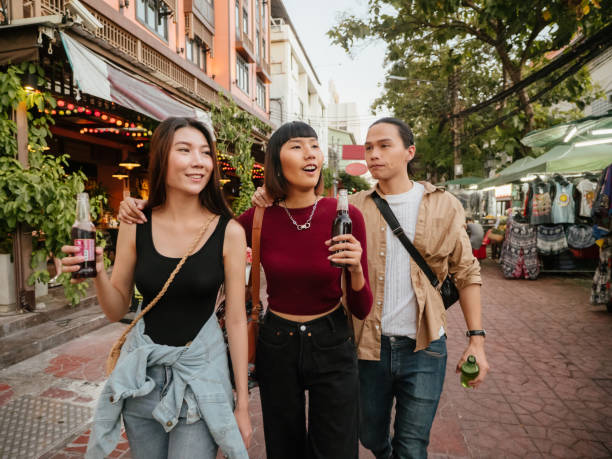 istock Young friends embracing and having fun together and drinking alcohol 1193331189