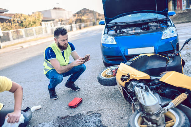 istock Male Photographing Damage In Traffic Accident 1193332090