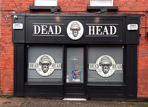11th December 2019, Bray, County Wicklow, Ireland. Dead Head Urban Barbers store front in Bray town.