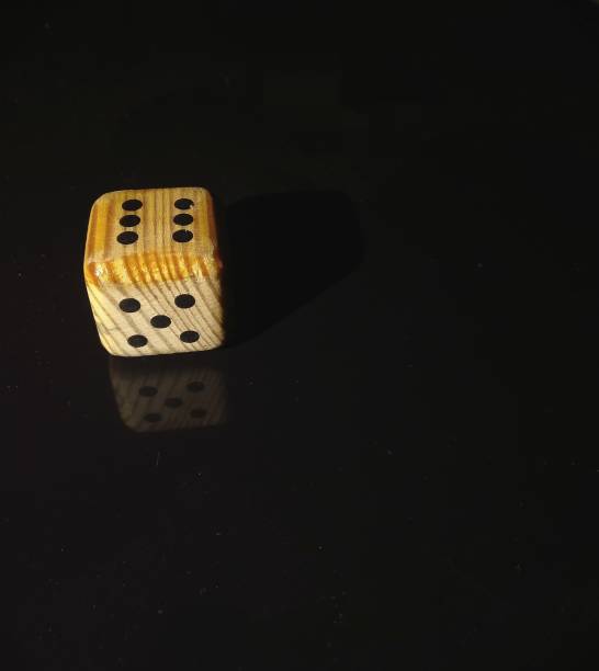 istock Wooden dice of a board game 1193339157
