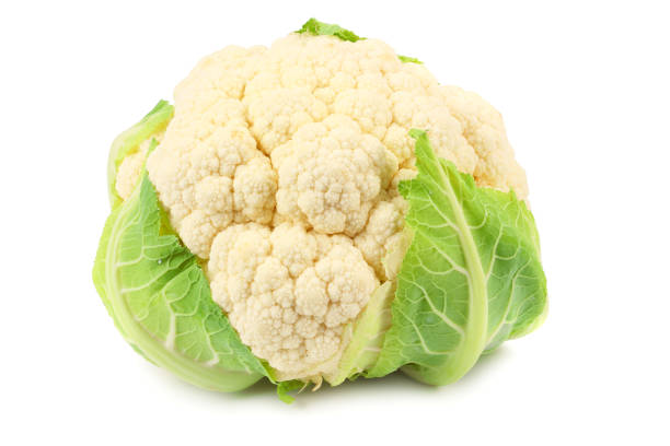 istock cauliflower isolated on white background. head of cauliflower 1193339999