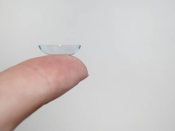 istock one contact lens on the finger close up 1193342497