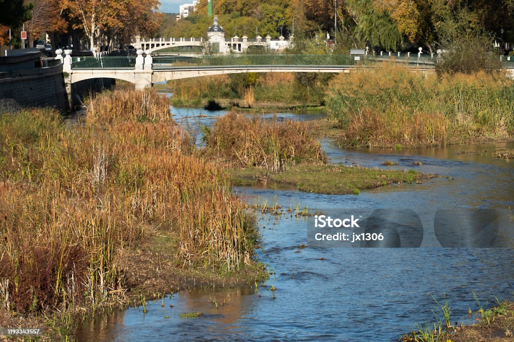 Madrid manazanares river, as it passes through the area of ââthe M30 and the former Calderon Stadium Built Structure Stock Photo