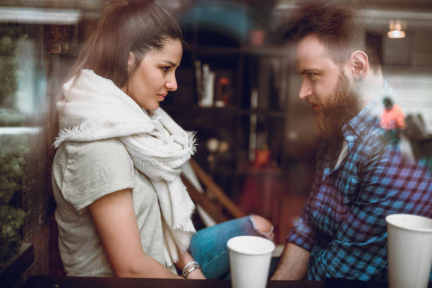 istock Couple Having A Staring Contest Over Coffee 1193344202