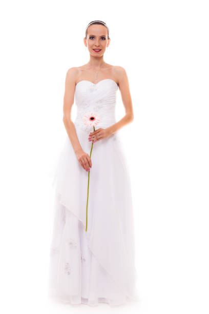 istock Full length bride in white wedding gown isolated 1193351096