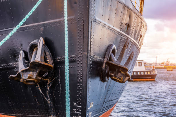 The nose and anchors of a black icebreaker moored in the port. The nose and anchors of a black icebreaker moored in the port marines navy sea captain stock pictures, royalty-free photos & images