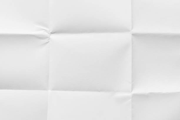 istock Blank paper folded in nine, close-up 1193353640